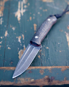 The EDC Knife, D2 steel, black micarta, kydex.