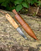The puukko knife RWL-34 powder steel.
