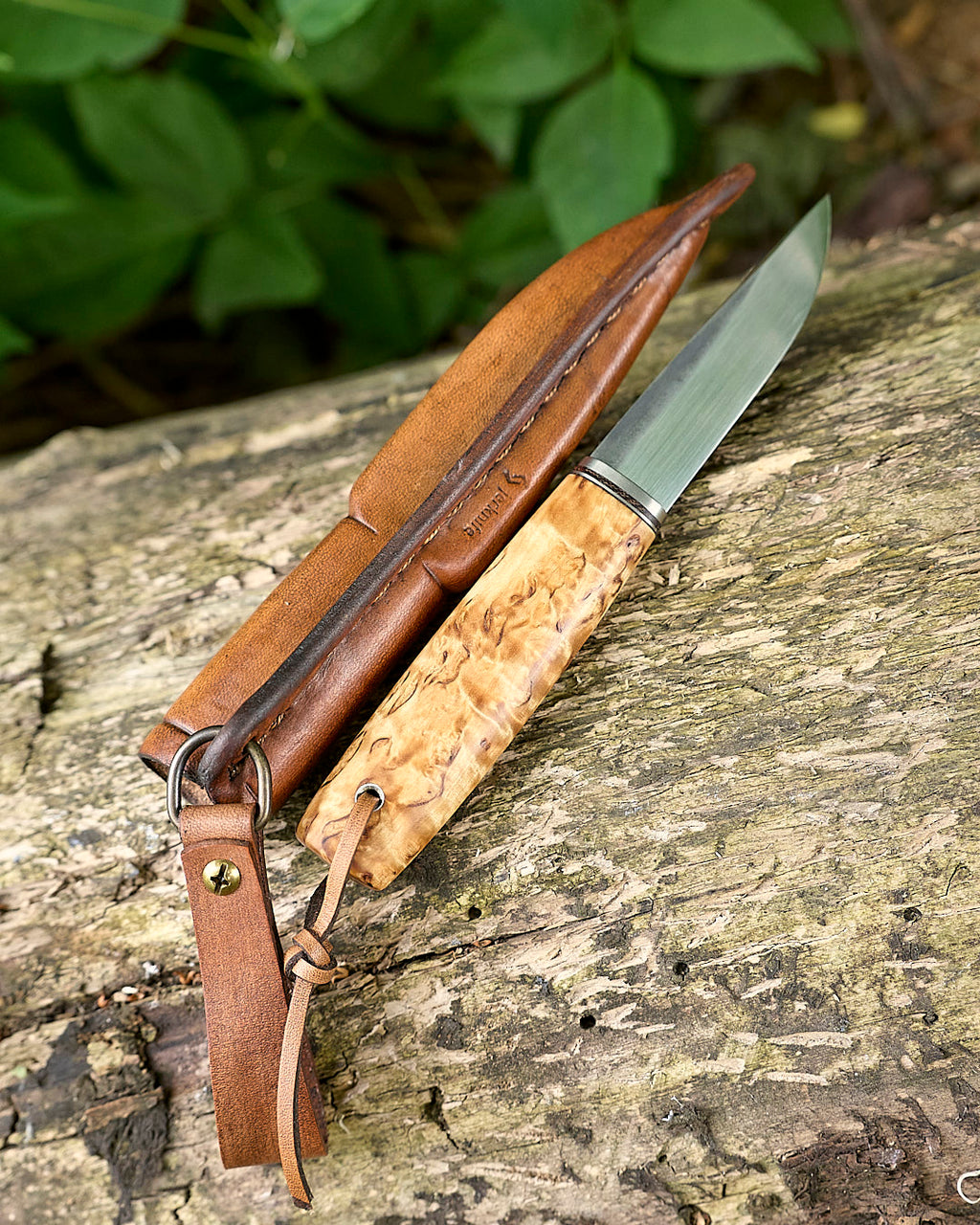 The puukko knife RWL-34 powder steel.