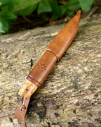 The puukko knife RWL-34 powder steel.