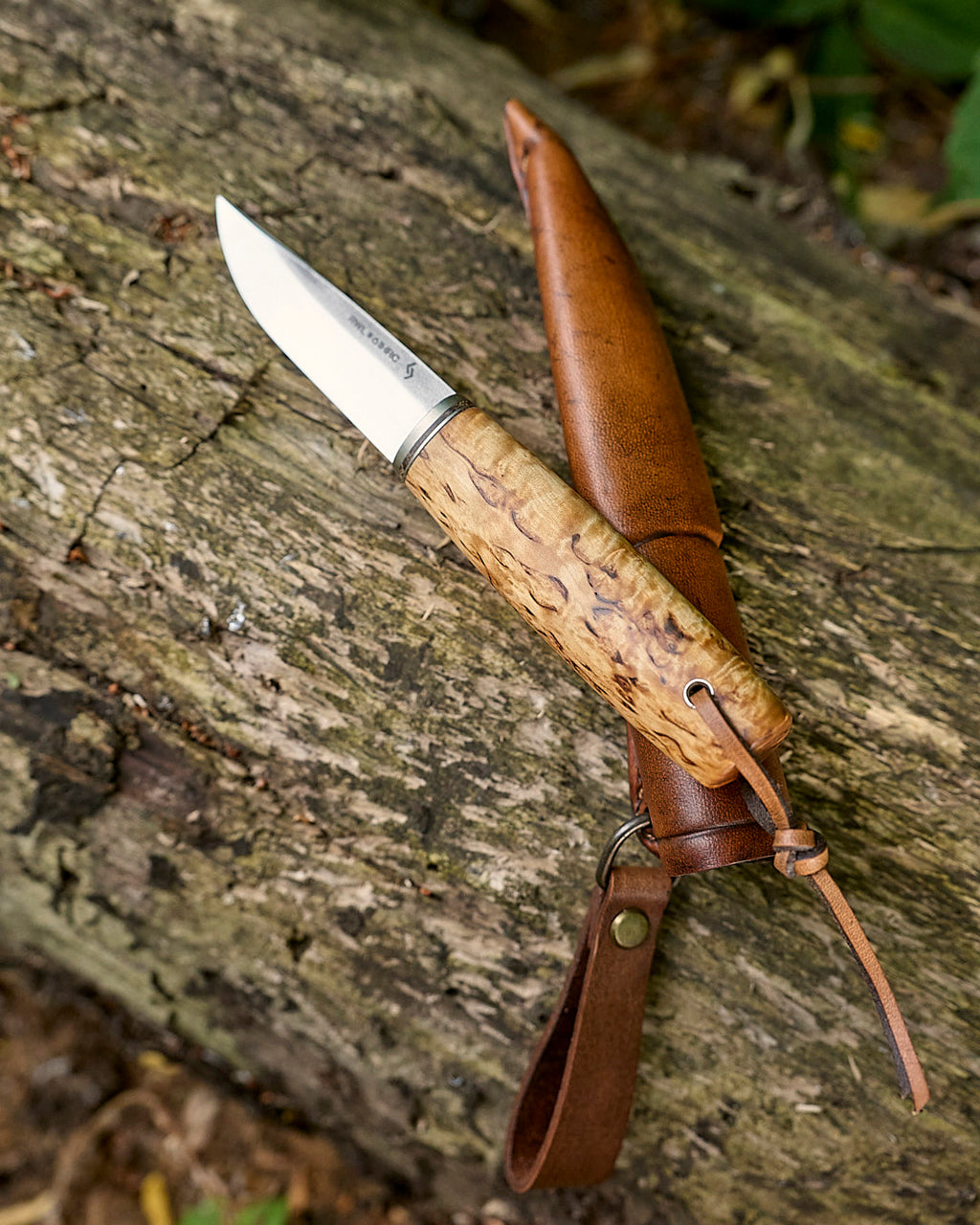 The puukko knife RWL-34 powder steel.
