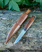 The m390 steel, ironwood, puukko knife.