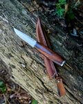 The m390 steel, ironwood, puukko knife.