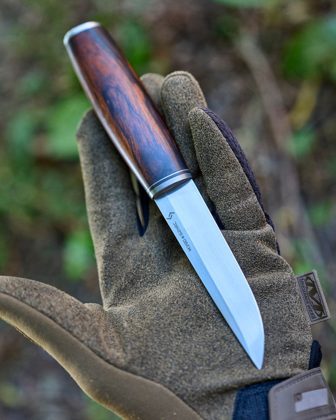 The m390 steel, ironwood, puukko knife.