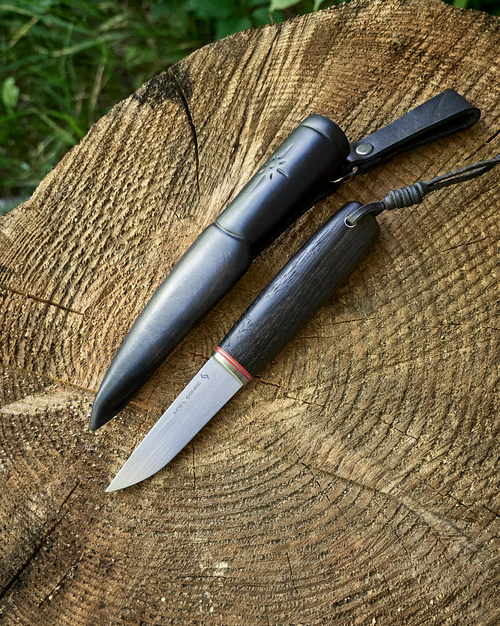 The puukko knife AEB-L steel, stab bog oak, leather sheath.