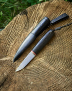 The puukko knife AEB-L steel, stab bog oak, leather sheath.