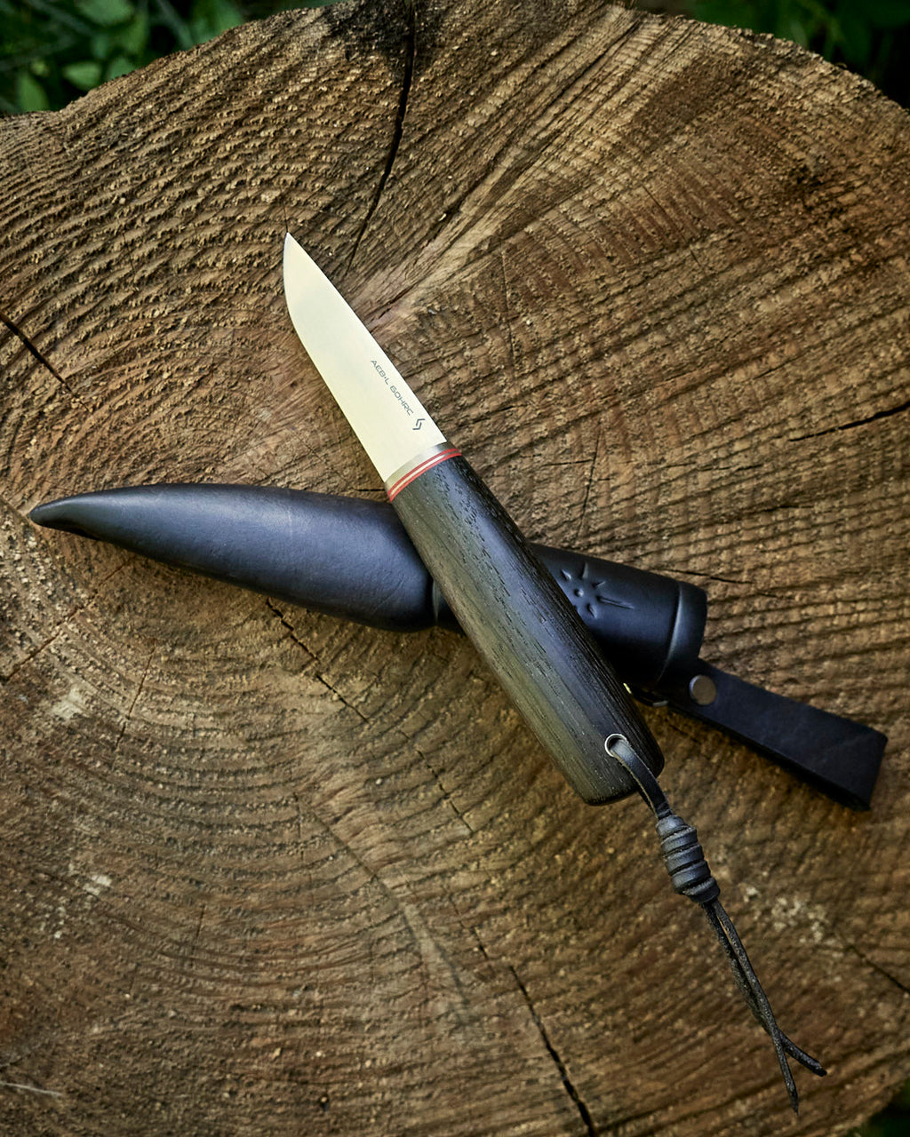 The puukko knife AEB-L steel, stab bog oak, leather sheath.