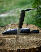 The puukko knife AEB-L steel, stab bog oak, leather sheath.
